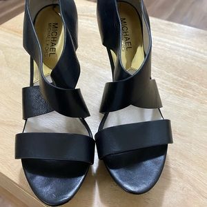 Black Micheal Kors heels.